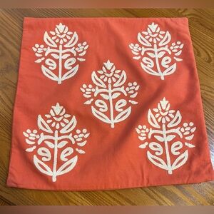 Pottery Barn Kyla Coral Zippered Pillow Cover with White Embroidery Detail.